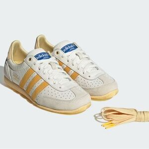 Adidas Cream and Gold Striped Sneakers